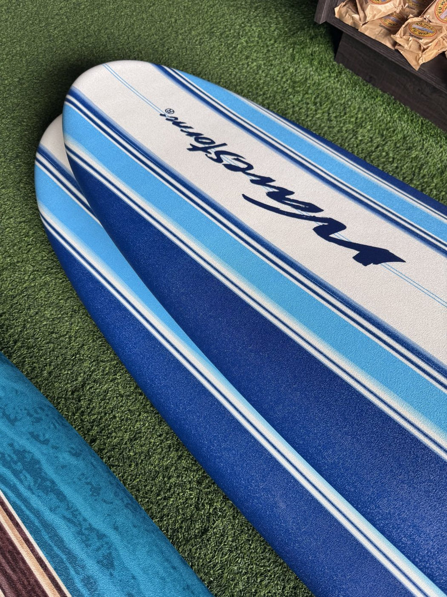 Blue soft top rental surfboard